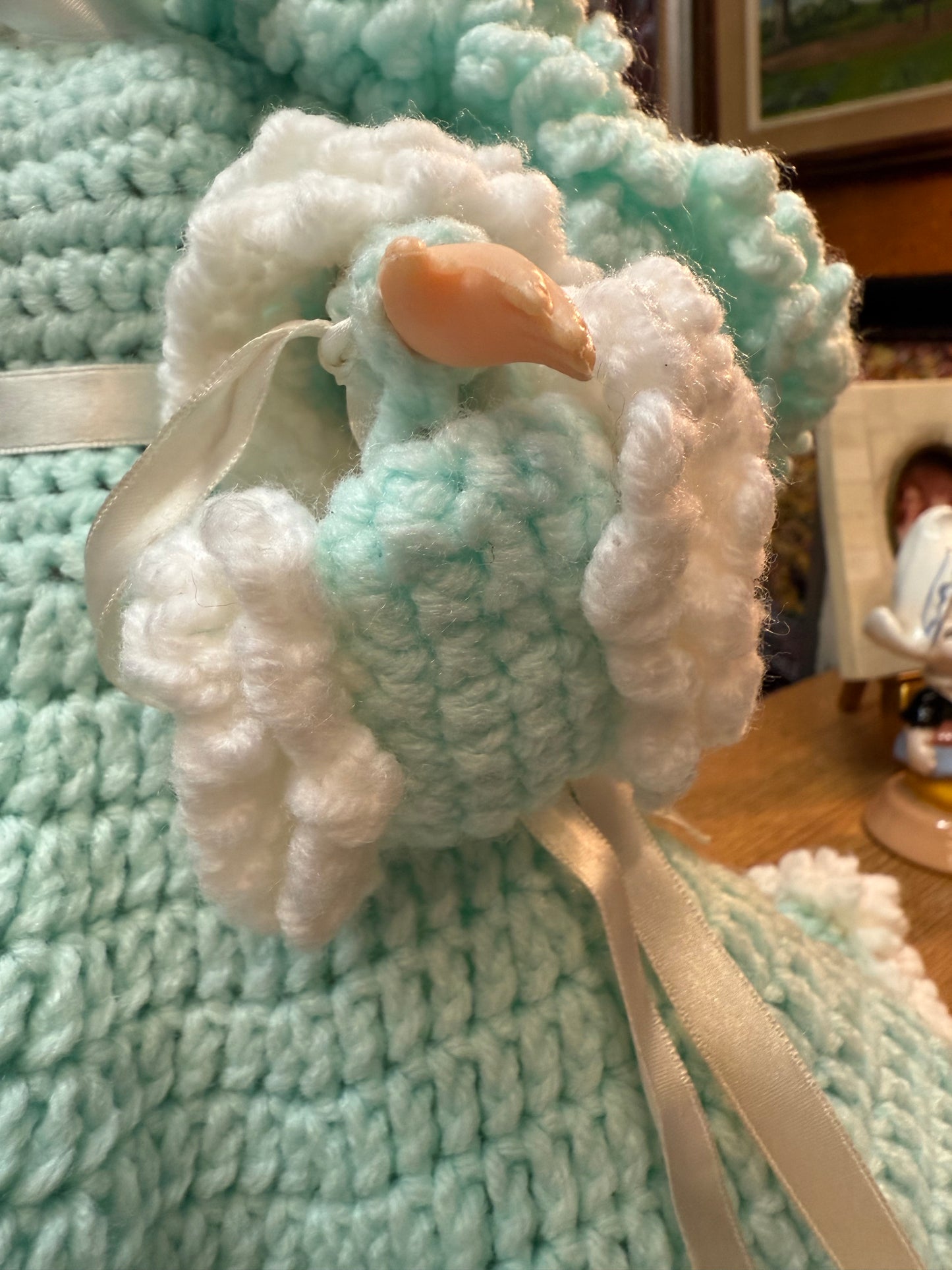 The Quiet Visitor — Handmade Crocheted Doll in Turquoise with Muff Hand Warmer