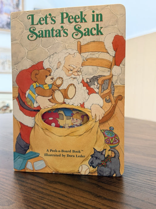 Let’s Peek in Santa’s Sack Board Book 1990 Dora Leder Vintage Peek-a-Board Funny