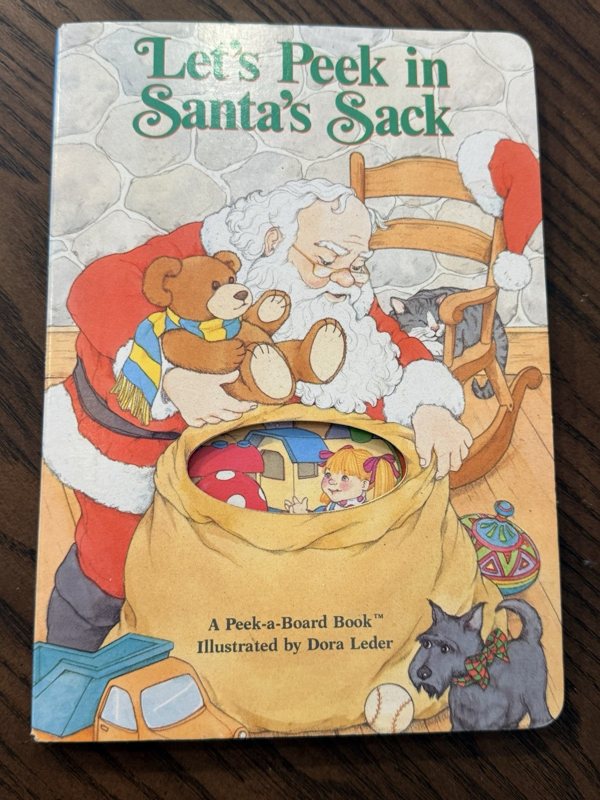 Let’s Peek in Santa’s Sack Board Book 1990 Dora Leder Vintage Peek-a-Board Funny